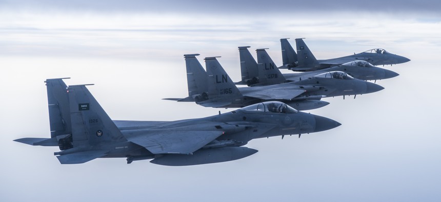 U.S.-made Royal Saudi Air Force F-15C Eagles fly in formation with U.S. Air Force F-15Cs in the U.S. Central Command area of responsibility, June 2, 2019. 