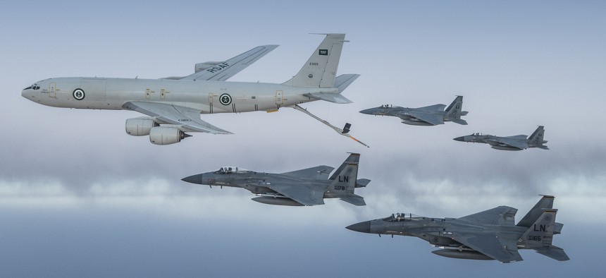 A Royal Saudi Air Force K-3 Tanker and Royal Saudi Air Force F-15C Eagles fly in formation with U.S. Air Force F-15Cs in the U.S. Central Command area of responsibility, June 2, 2019.