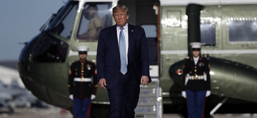 President Donald Trump walks to board Air Force One at Marine Corps Air Station Miramar, Wednesday, Sept. 18, 2019, in San Diego, Calif.