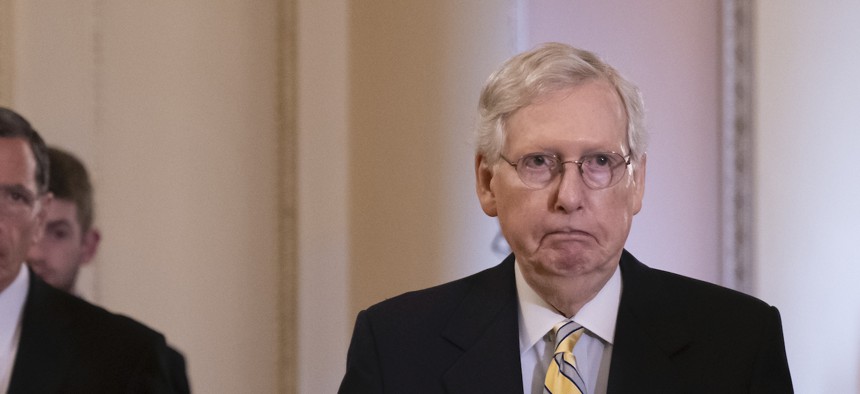 Senate Majority Leader Mitch McConnell, R-Ky.,  arrives to speak to reporters during a news conference at the Capitol in Washington, Tuesday, Sept. 17, 2019.