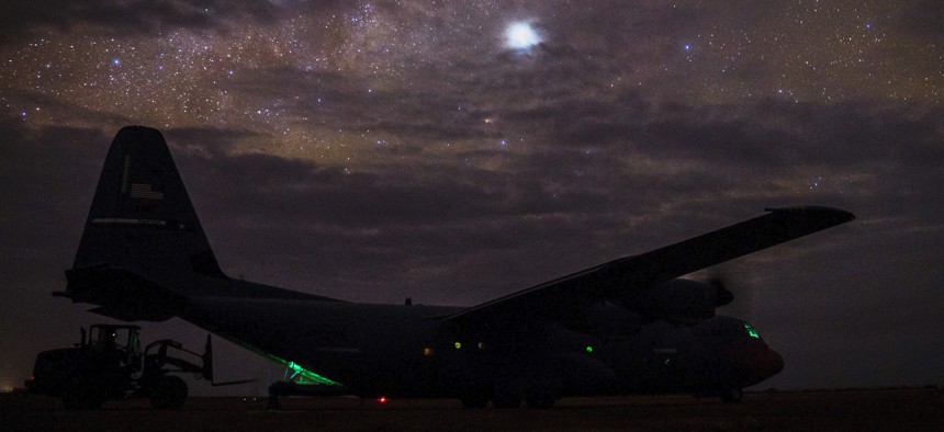 A C-130J Super Hercules, assigned to the 75th Expeditionary Airlift Squadron, sits on the taxiway while cargo is unloaded in Somalia, on August 25, 2019.