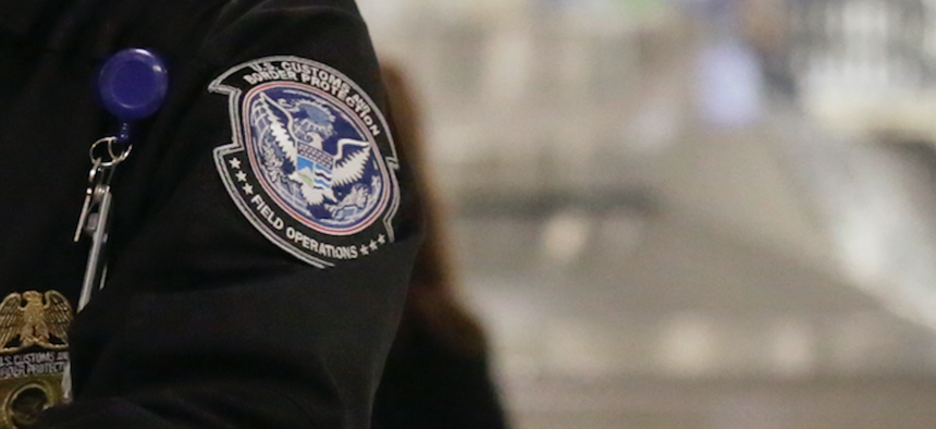 2016 photo of a Customs and Border Protection officer at Dulles International Airport.