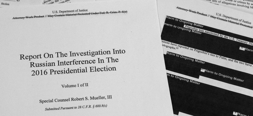 In this April 18, 2019, file photo, special counsel Robert Mueller's redacted report on Russian interference in the 2016 presidential election is photographed in Washington.