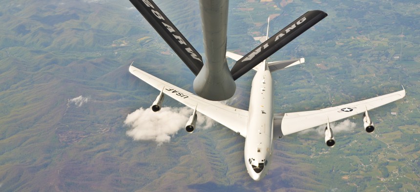 An E-8C Joint Surveillance Target Attack Radar System aircraft approaches the boom of a KC-135R Stratotanker assigned to the 128th Air Refueling Wing, Wisconsin Air National Guard, April 20, 2016.