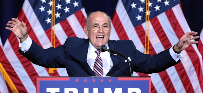 Former Mayor Rudy Giuliani of New York City speaking to supporters at an immigration policy speech hosted by Donald Trump at the Phoenix Convention Center in Phoenix, Arizona, in August 2016.