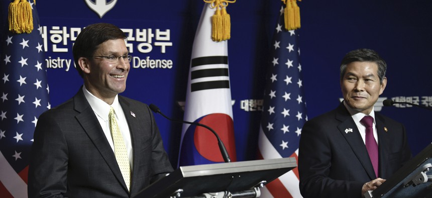 U.S. Defense Secretary Mark Esper, left, and South Korean Defense Minister Jeong Kyeong-doo, right, hold a joint press conference after the 51st Security Consultative Meeting (SCM) at the Defense Ministry in Seoul Friday, Nov. 15, 2019.