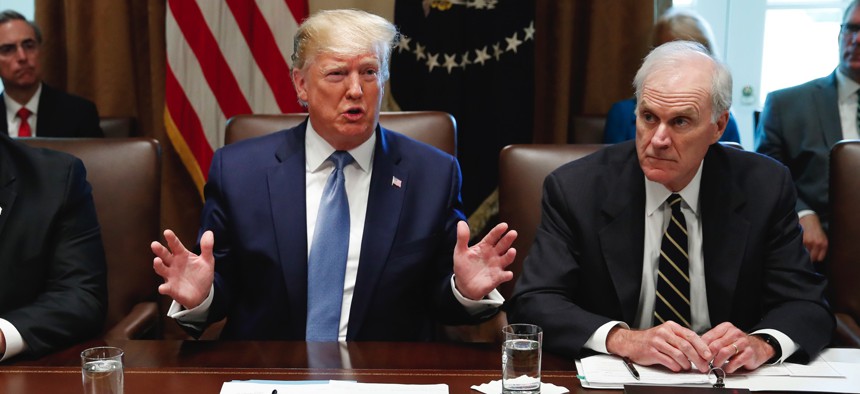 President Donald Trump speaks during a July 2019 Cabinet meeting in the Cabinet Room of the White House. Right, then-Acting Secretary of Defense Richard Spencer.
