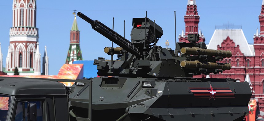 An unmanned combat ground vehicle Uran-9 is carried by a truck during the Victory Day military parade to celebrate 73 years since the end of WWII and the defeat of Nazi Germany, in Moscow, Russia, Wednesday, May 9, 2018.