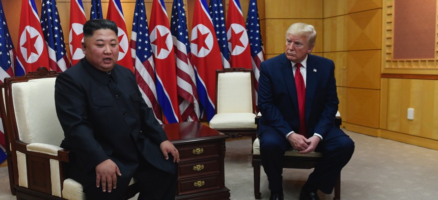 President Donald Trump meets with North Korean leader Kim Jong Un at the border village of Panmunjom in the Demilitarized Zone, South Korea, Sunday, June 30, 2019. 