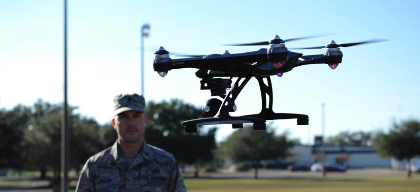 Maj. Joshua D. Pitler, 81st Operations Support Flight commander, operates an Unmanned Aerial System, more commonly known as a drone, Dec. 8, 2015, at Keesler Air Force Base, Miss.
