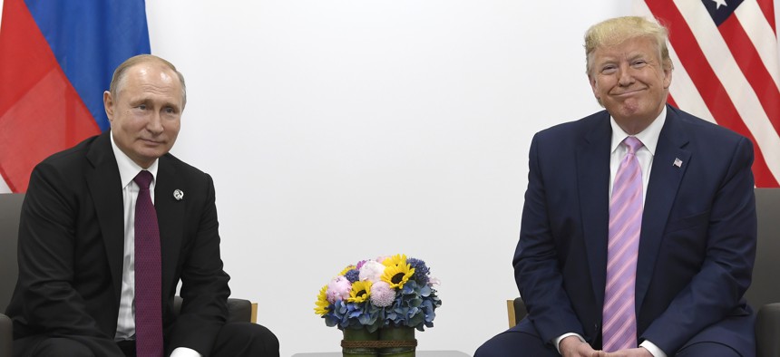 President Donald Trump, right, meets with Russian President Vladimir Putin during a bilateral meeting on the sidelines of the G-20 summit in Osaka, Japan, Friday, June 28, 2019.