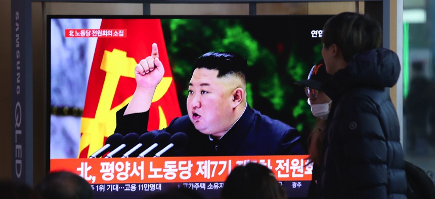 People watch a TV screen showing an image of North Korean leader Kim Jong Un during a news program at the Seoul Railway Station in Seoul, South Korea, Sunday, Dec. 29, 2019. 
