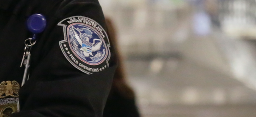 2016 photo of a Customs and Border Protection officer at Dulles International Airport.