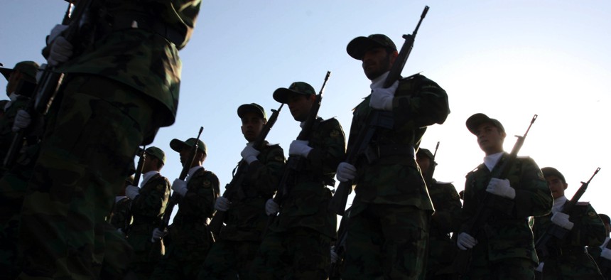 In this 2007 photo, members of the Islamic Revolution Guards Corps forces parade in Tehran to mark the 27th anniversary of the Iraqi invasion of Iran.