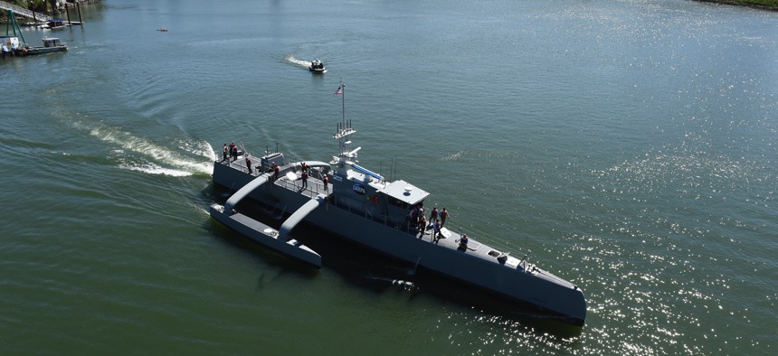 In this 2016 photo, Sea Hunter, a new type of unmanned ocean-going vessel gets underway on the Williammette River following a christening ceremony in Portland, Ore.
