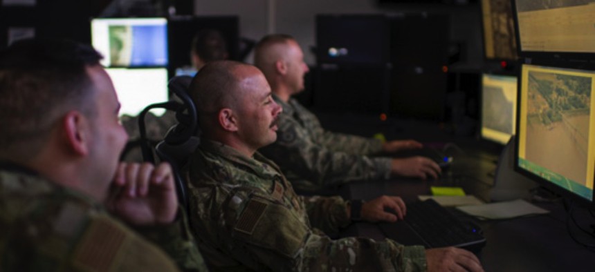 Intelligence analysts with the Indiana Air National Guard's 181st Intelligence Wing help the JAIC develop artificial intelligence programs for domestic operations at Hulman Field Indiana National Guard Base, Ind., on Nov. 02, 2019.