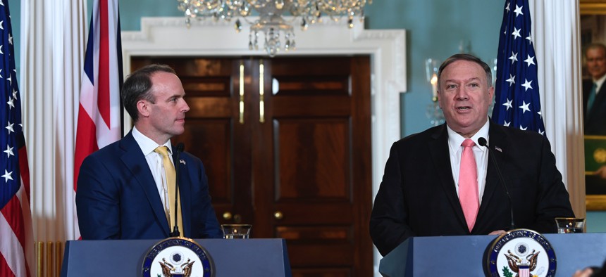 Secretary of State Mike Pompeo, right, speaks during a press availability with Britain's Foreign Secretary Dominic Raab, left, at the State Department in Washington, Wednesday, Aug. 7, 2019.