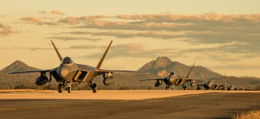 U.S. Air Force F-22 Raptors taxi at Royal Australian Air Force Base Amberley during a July 2019 exercise.