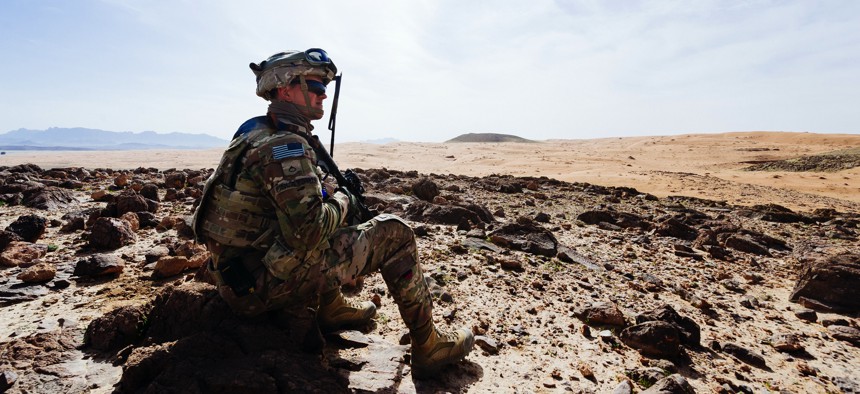 A U.S. soldier surveys a training ground near Kandahar, Afghanistan, March 14, 2017. 