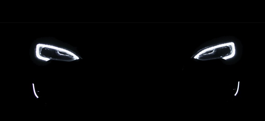 The running lights of a Tesla electric vehicle