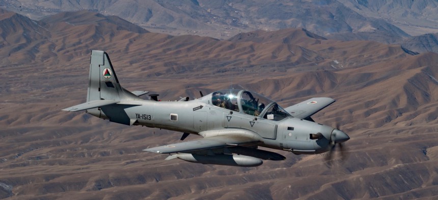 An Afghan pilot conducts training in an A-29 Super Tucano over Kabul, Afghanistan as part of the Train Advise and Assist Command's (TAAC-Air) mission on Dec. 20, 2018. 