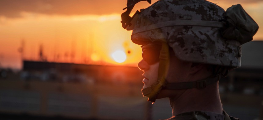 A Marine stands watch during the security reinforcement of the U.S. Embassy compound in Baghdad, Jan. 4, 2020.