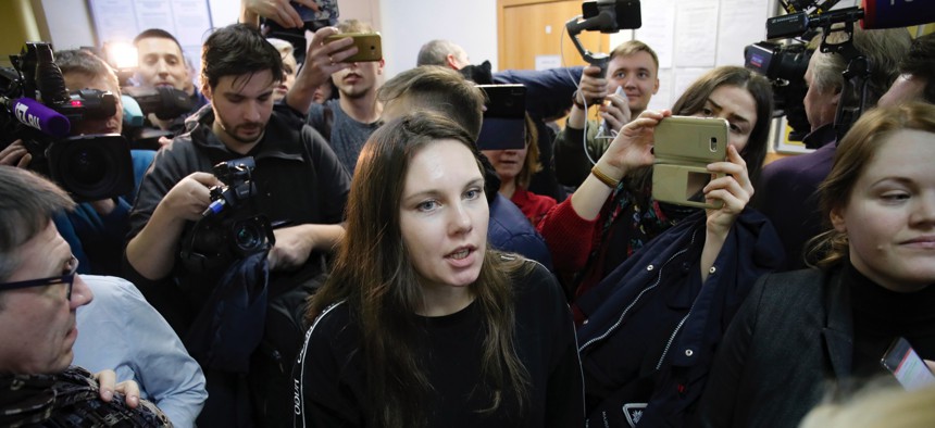 Alla Ilyina, who broke out of a Russian hospital on Feb. 7 after learning that she would have to spend 14 days in isolation instead of the 24 hours doctors promised her, speaks to the media in a courtroom in St. Petersburg, Russia, on Feb. 17, 2020.