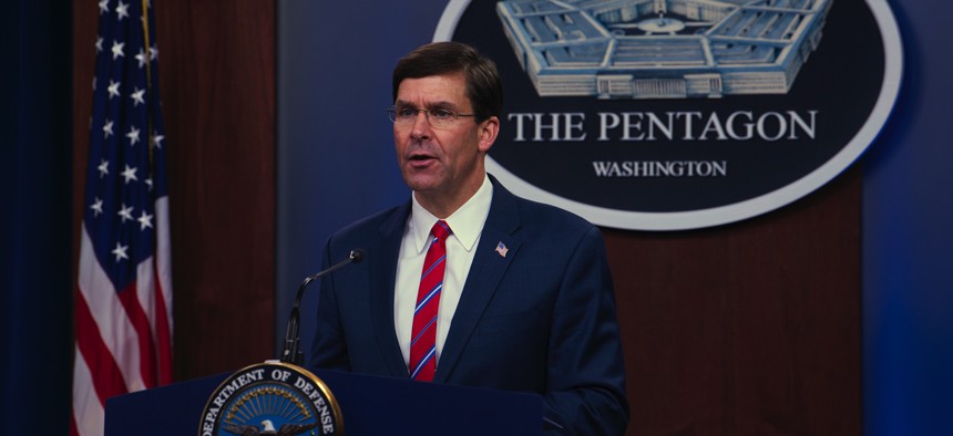 Defense Secretary Mark Esper speaks to members of the media during a news conference to discuss the department's efforts in response to the COVID-19 pandemic at the Pentagon Briefing Room in Washington, on Monday, March 23, 2020