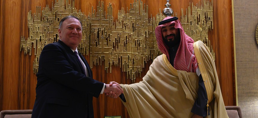 U.S. Secretary of State Mike Pompeo, left, shakes hands with Saudi Arabia's Crown Prince Mohammed bin Salman at Irqah Palace, in the capital Riyadh Saudi Arabia, Thursday, February 20, 2020.