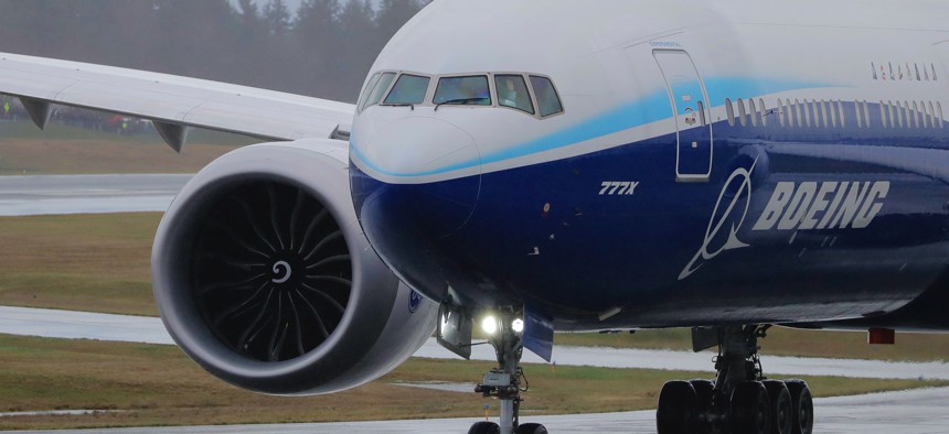 A Boeing 777X airplane leaves the company's Everett, Washington, factory on Jan. 24, 2020. Company officials announced that several plants will suspend operations for public-health reasons.