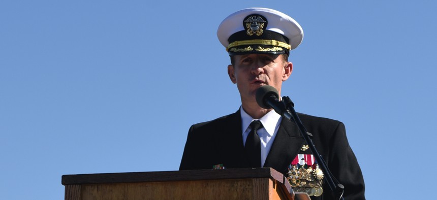 In this November 2019 photo, Capt. Brett Crozier addresses the crew for the first time as commanding officer of the aircraft carrier USS Theodore Roosevelt (CVN 71) during a change of command ceremony on the ship’s flight deck.