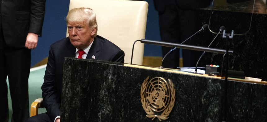 President Donald Trump sits down after delivering a speech to the United Nations General Assembly, Tuesday, Sept. 25, 2018, at U.N. Headquarters. 