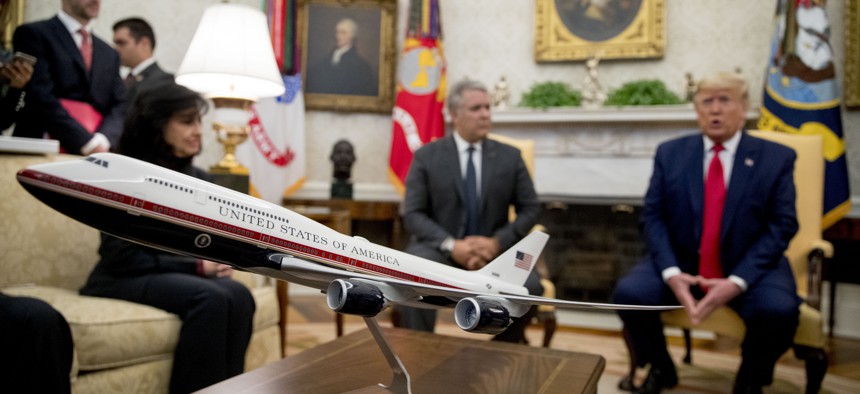 A model of the new Air Force One design sits on a table as President Donald Trump meets with Colombian President Ivan Duque in the Oval Office of the White House.