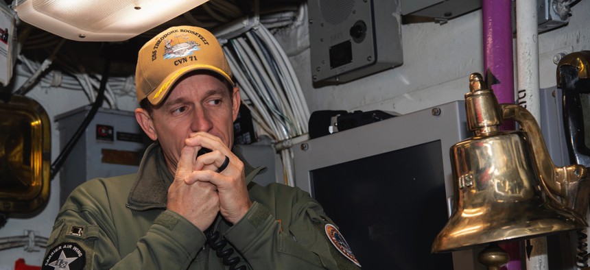In this image provided by the U.S. Navy, Capt. Brett Crozier, then-commanding officer of the aircraft carrier USS Theodore Roosevelt (CVN 71), addresses the crew on Jan. 17, 2020, in San Diego, Calif.