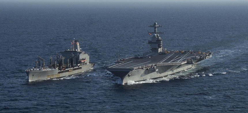 USS Gerald R. Ford (CVN 78) pulls alongside USNS Patuxent (T-AO 201) during a replenishment-at-sea May 15, 2020.