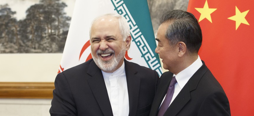 Chinese Foreign Minister Wang Yi meets Iranian Foreign Minister Mohammad Javad Zarif at the Diaoyutai State Guesthouse in Beijing, Friday, May 17, 2019. 