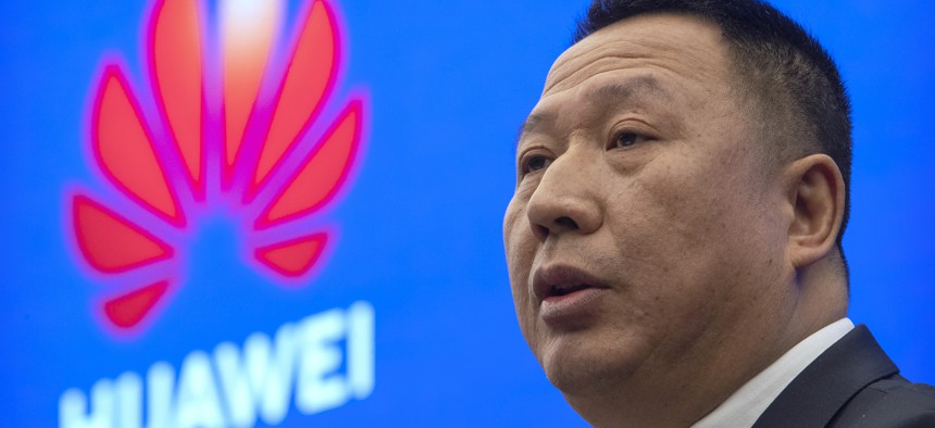 Song Liuping, chief legal officer of Huawei, speaks during a press conference at Huawei's campus in Shenzhen in southern China's Guandong Province, Thursday, Dec. 5, 2019.