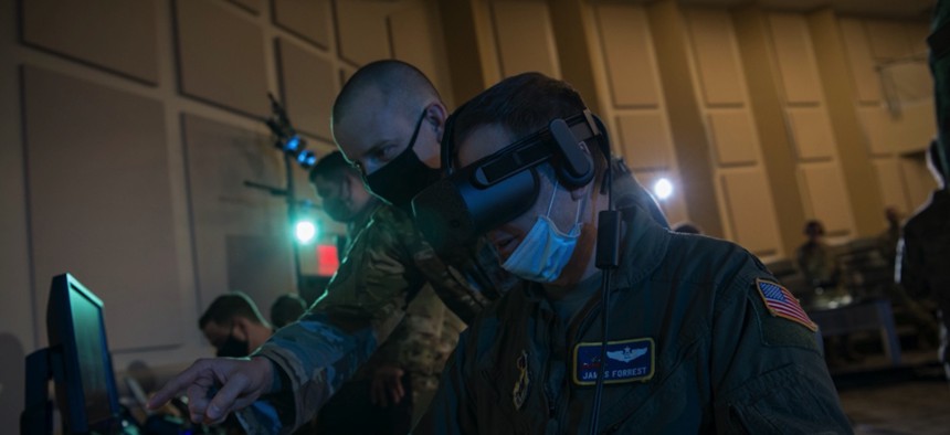 Lt. Col. James Forrest operates a virtual-reality headset in support of the Advanced Battle Management System, or ABMS, Onramp, Sept. 2, 2020, at Joint Base Andrews, Md.