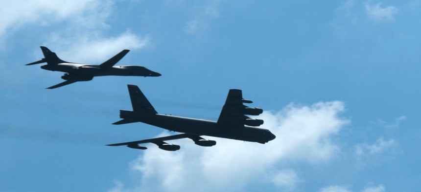 A B-1 Lancer and a B-52 Stratofortress fly over Barksdale Air Force Base, La., in 2015. 