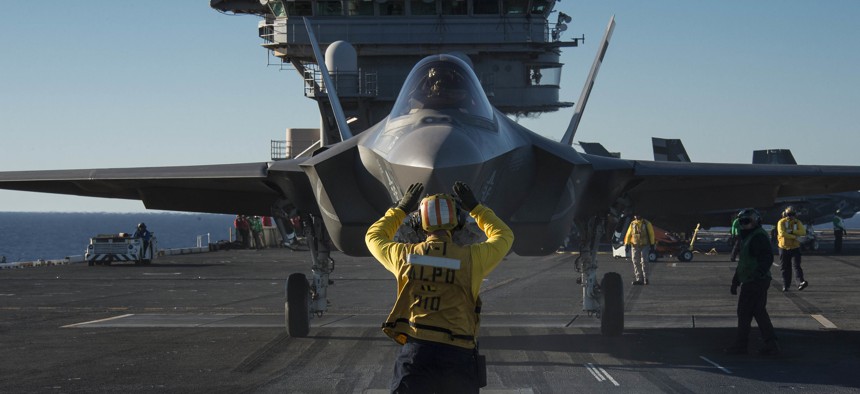 An F-35C Lightning II is prepared for launch aboard the aircraft carrier USS Nimitz (CVN 68) in the Pacific Ocean, Nov. 4, 2014.