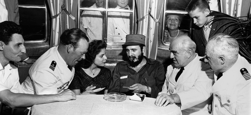 Fidel Castro aboard MS Berlin North German Lloyd cruise ship in Havana harbor. Left to right: First officer Ernest Hankiewicz; captain's daughter Marita Lorenz; Castro; Capt. Heinrich Lorenz, chief enginer Karl Kase. 