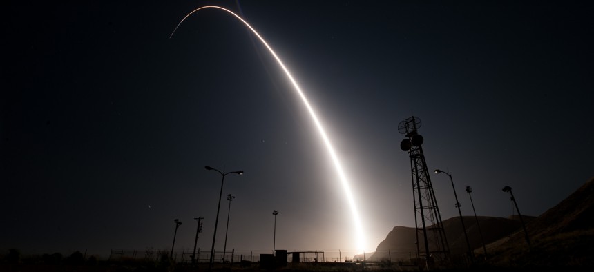 An unarmed Minuteman III intercontinental ballistic missile launches during an operational test at 12:03 a.m., PDT, April 26, from Vandenberg Air Force Base, Calif.