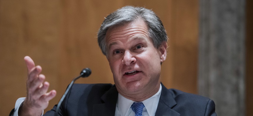 FBI Director Christopher Wray testifies during a Senate Homeland Security and Governmental Affairs Committee hearing on Sept. 24, 2020.
