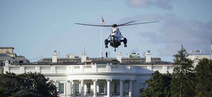 The helicopter that carried President Donald Trump to Walter Reed National Military Medical Center in Bethesda, Md., lands on the South Lawn of White House in Washington, Friday, Oct. 2, 2020.