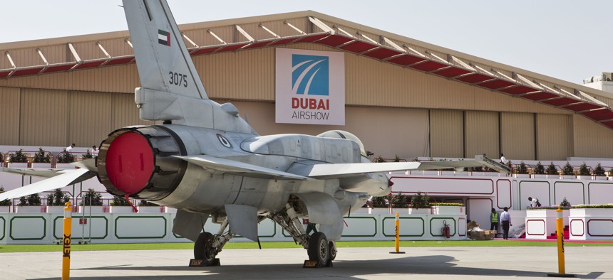 The UAE Block 60 F-16 stands strong out in front of the Dubai Airshow hanger.