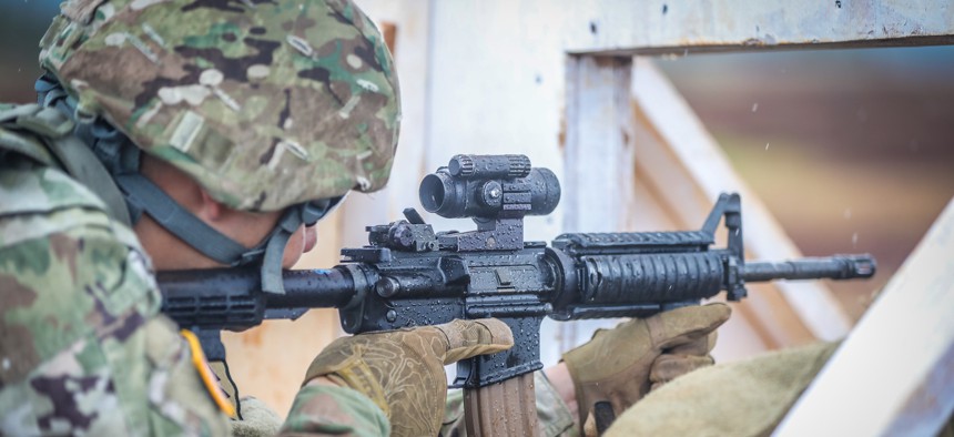 SCHOFIELD BARRACKS, Hawaii – Soldier with 25th Infantry Division Artillery “DIVARTY” gets ready to fire his M4 rifle during an M4 qualification range on Oct. 15, 2020 at Schofield Barracks, Hawaii.