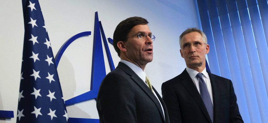 Defense Secretary Dr. Mark T. Esper gives remarks while meeting with NATO Secretary General Jens Stoltenberg in Brussels, Feb. 12, 2020.