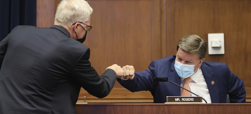 Now-Defense Secretary Christopher Miller, left, greets committee ranking member Rep. Mike Rogers, R-Ala., before a House Committee on Homeland Security hearing on 'worldwide threats to the homeland', Thursday, Sept. 17, 2020 on Capitol Hill Washington.