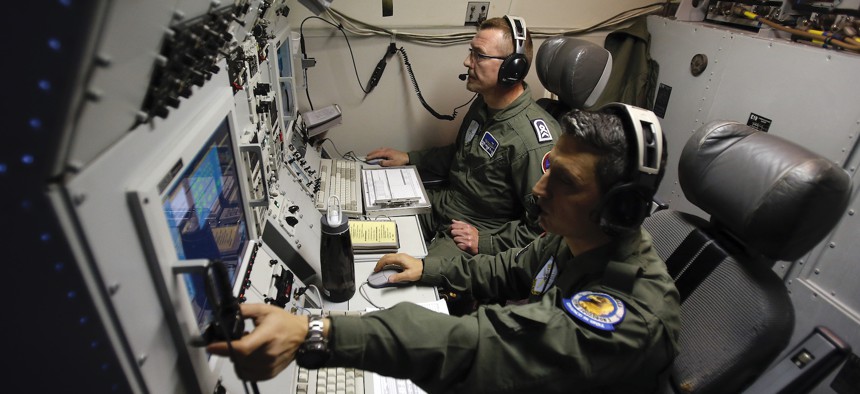 Inside a NATO AWACS plane during a patrol over Romania and Poland in 2014.