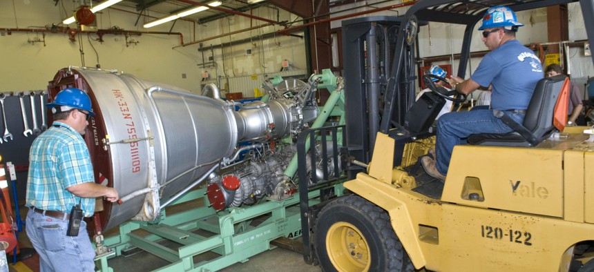 An Aerojet AJ26 rocket engine was delivered to NASA's John C. Stennis Space Center on July 15, 2010. This is the first of a series of Taurus II engines to be tested at Stennis to include acceptance testing of flight engines.